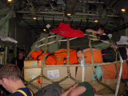 Cargo and people jammed inside the C-130 (click to enlarge; 1.34 MB)