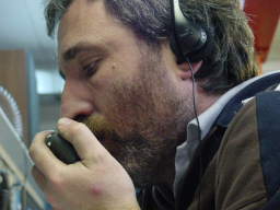 A closeup of Paolo communicating via HF radio to Dome C (click to enlarge; 1.45 MB)