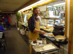 Paolo serving himself dinner in the Galley (click to enlarge; 1.41 MB)